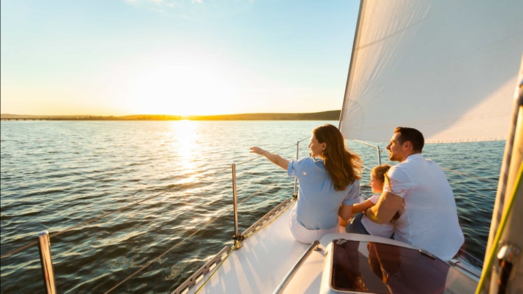 A background image of people on a boat